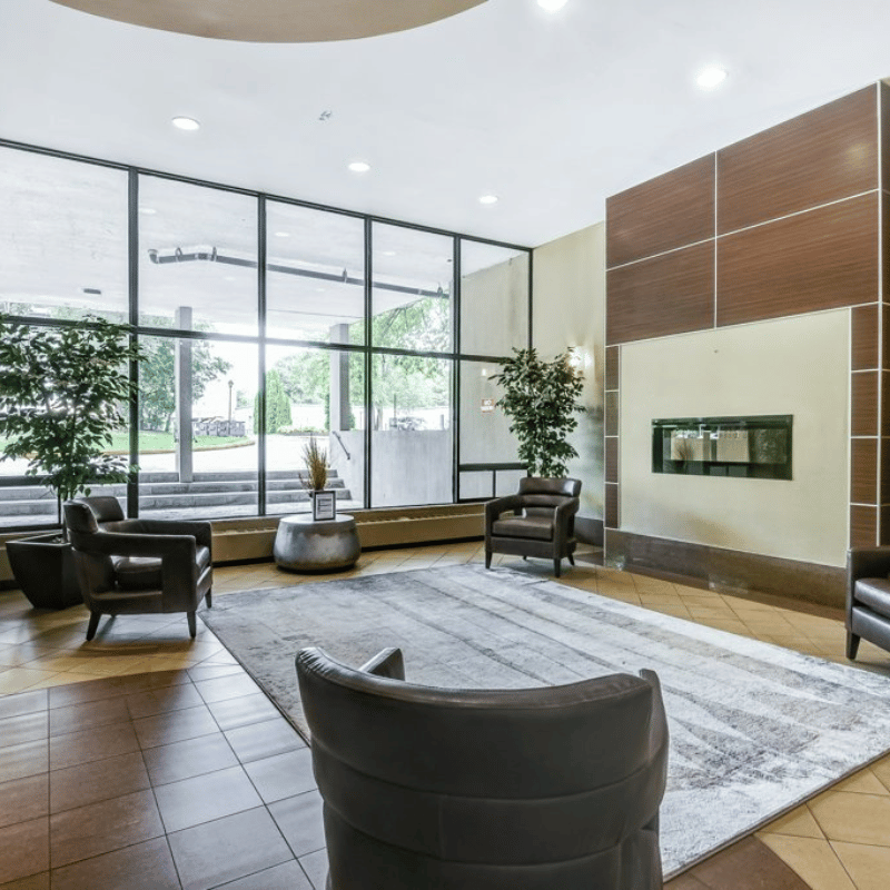 Welcoming lobby with fireplace at York Mills & Leslie.